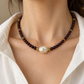 Collier Janice